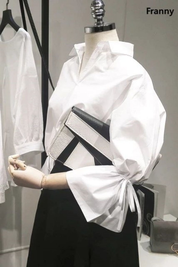Moda anti-idade: Camisa feminina branca moderna